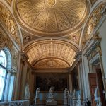 Sculpture room in grand setting.